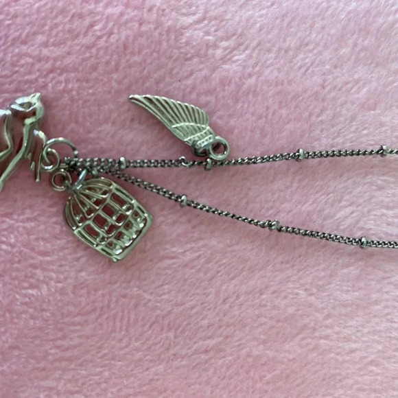 Silvertoned Necklace with multicharm(cage, bird and wing charms) pendant - Picture 9 of 9